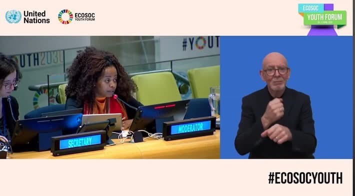 An ECOSOC Youth Forum broadcast with a speaker at a desk marked Moderator and a sign-language interpreter.